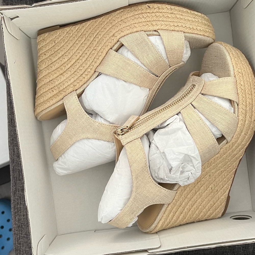 Brand new Michael Kors wedges.